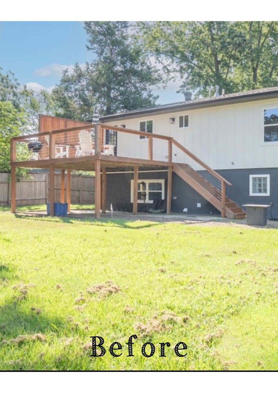 A sagging cable rail deck on a two story home before being torn down