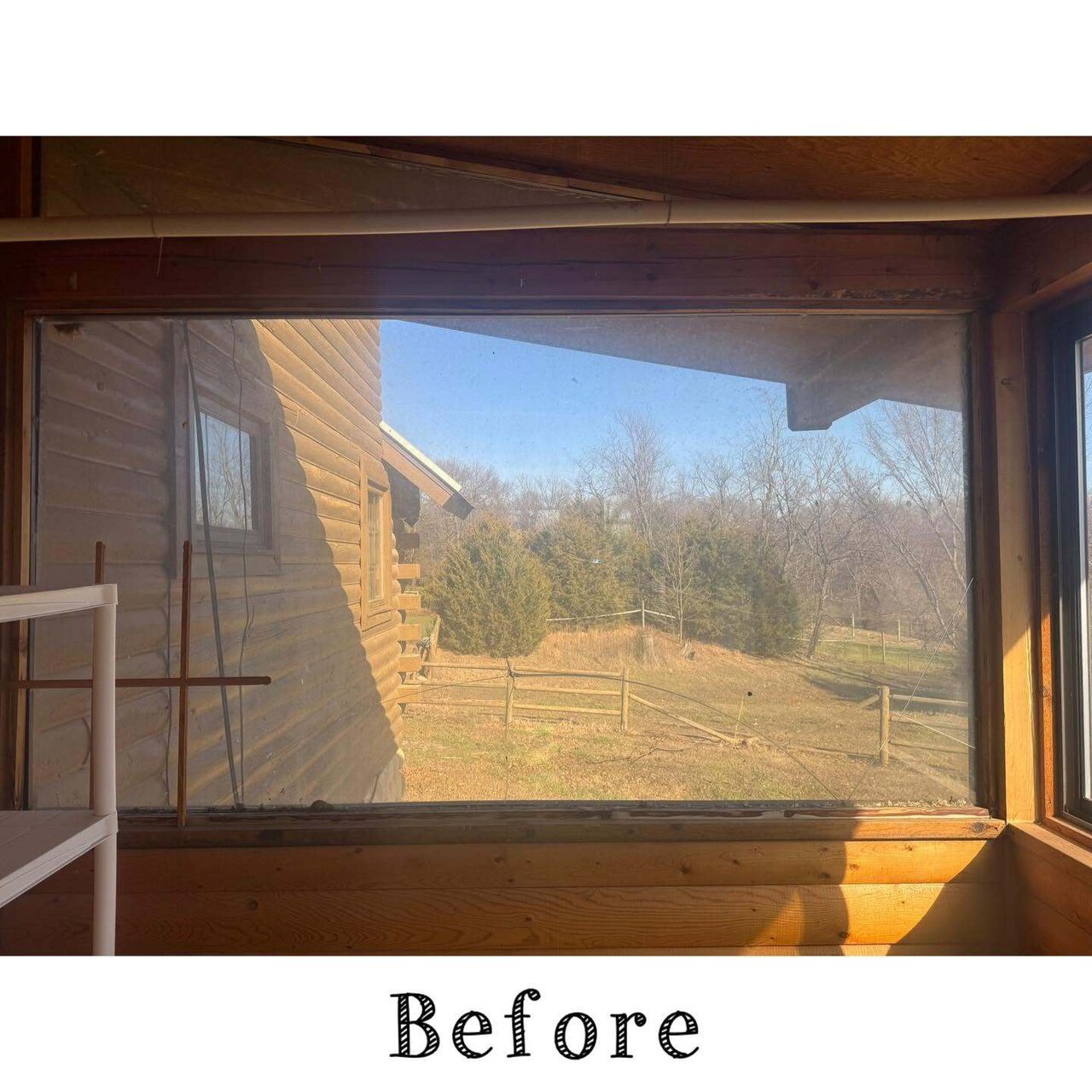 A log home sunroom with raw unfinished window openings before finishing